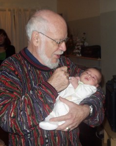 Gordon McClure with a grandchild