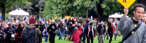 Jode Roberts of DSF leading a crowd through Fred Hamilton Park