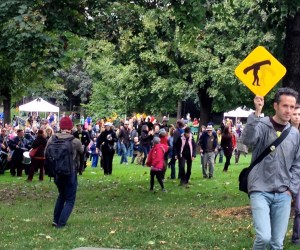 Jode Roberts of DSF leading a crowd through Fred Hamilton Park